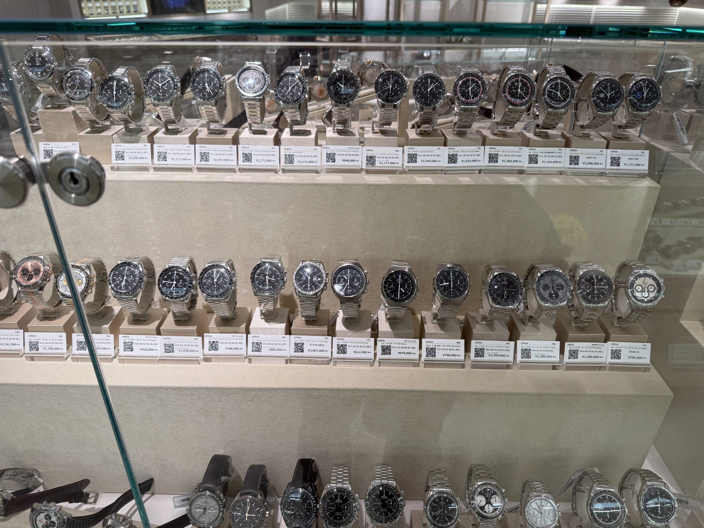 Watches behind glass